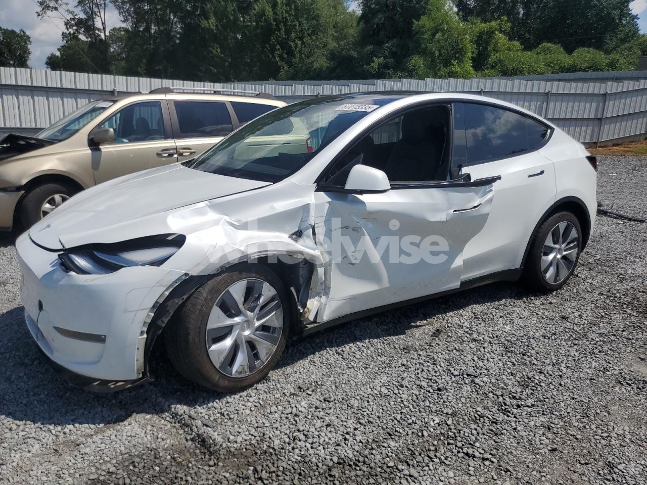 2023 TESLA MODEL Y (VIN 7SAYGDEE9PA099570) main photo