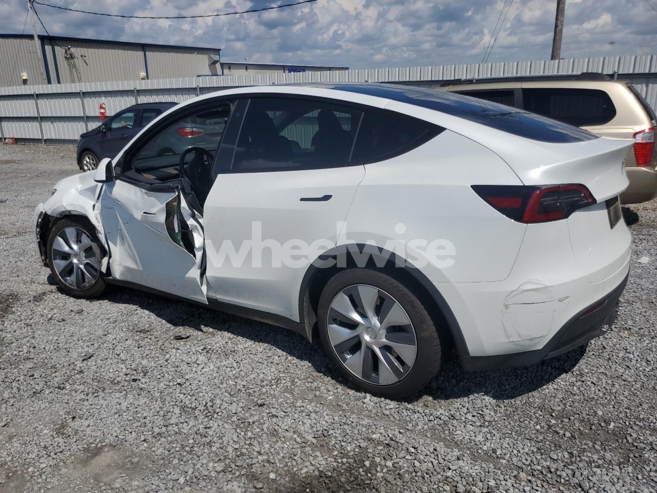 Photo 2 of 2023 TESLA MODEL Y (VIN 7SAYGDEE9PA099570)