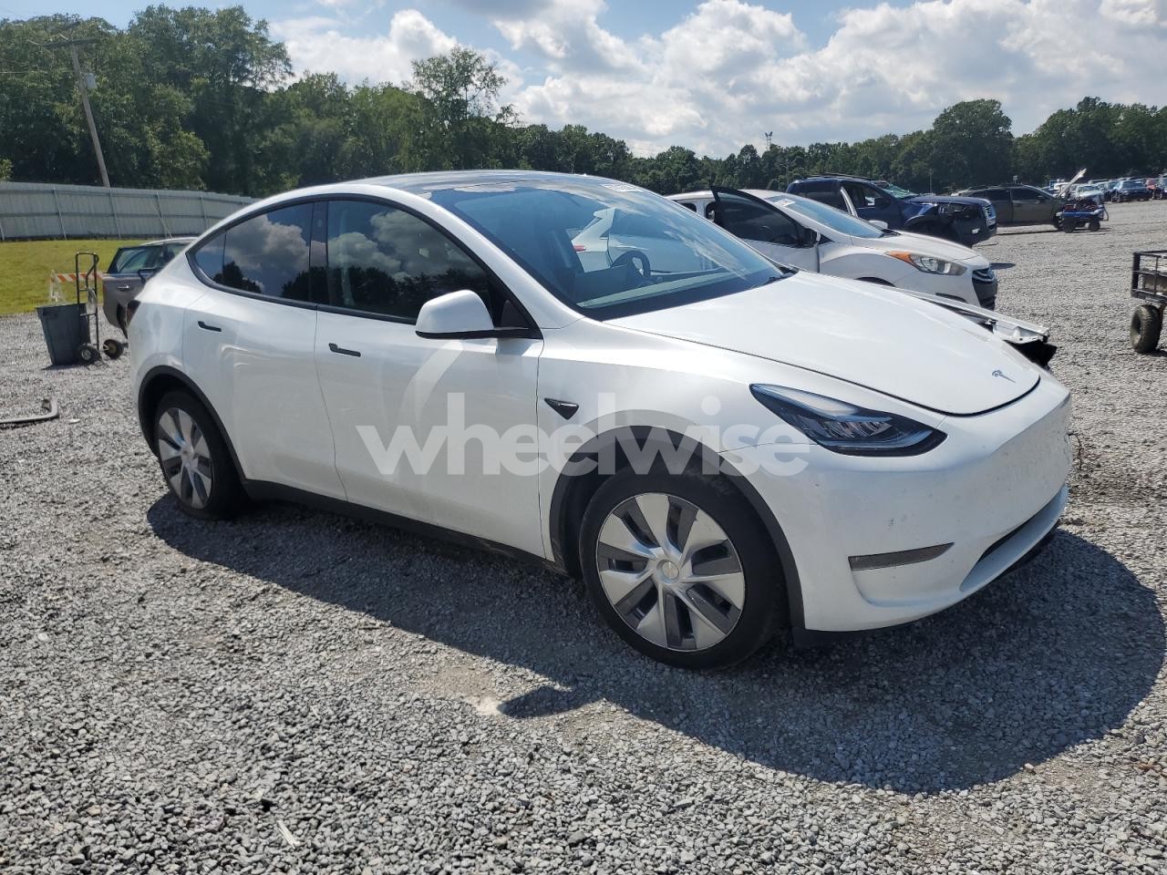 Photo 4 of 2023 TESLA MODEL Y (VIN 7SAYGDEE9PA099570)