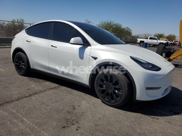 Photo 4 of 2023 TESLA MODEL Y (VIN 7SAYGDEE9PF583113)
