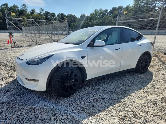 Photo 2 of 2023 TESLA MODEL Y (VIN 7SAYGDEE9PF610603)