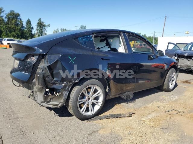 Photo 2 of 2023 TESLA MODEL Y (VIN 7SAYGDEE9PF647134)