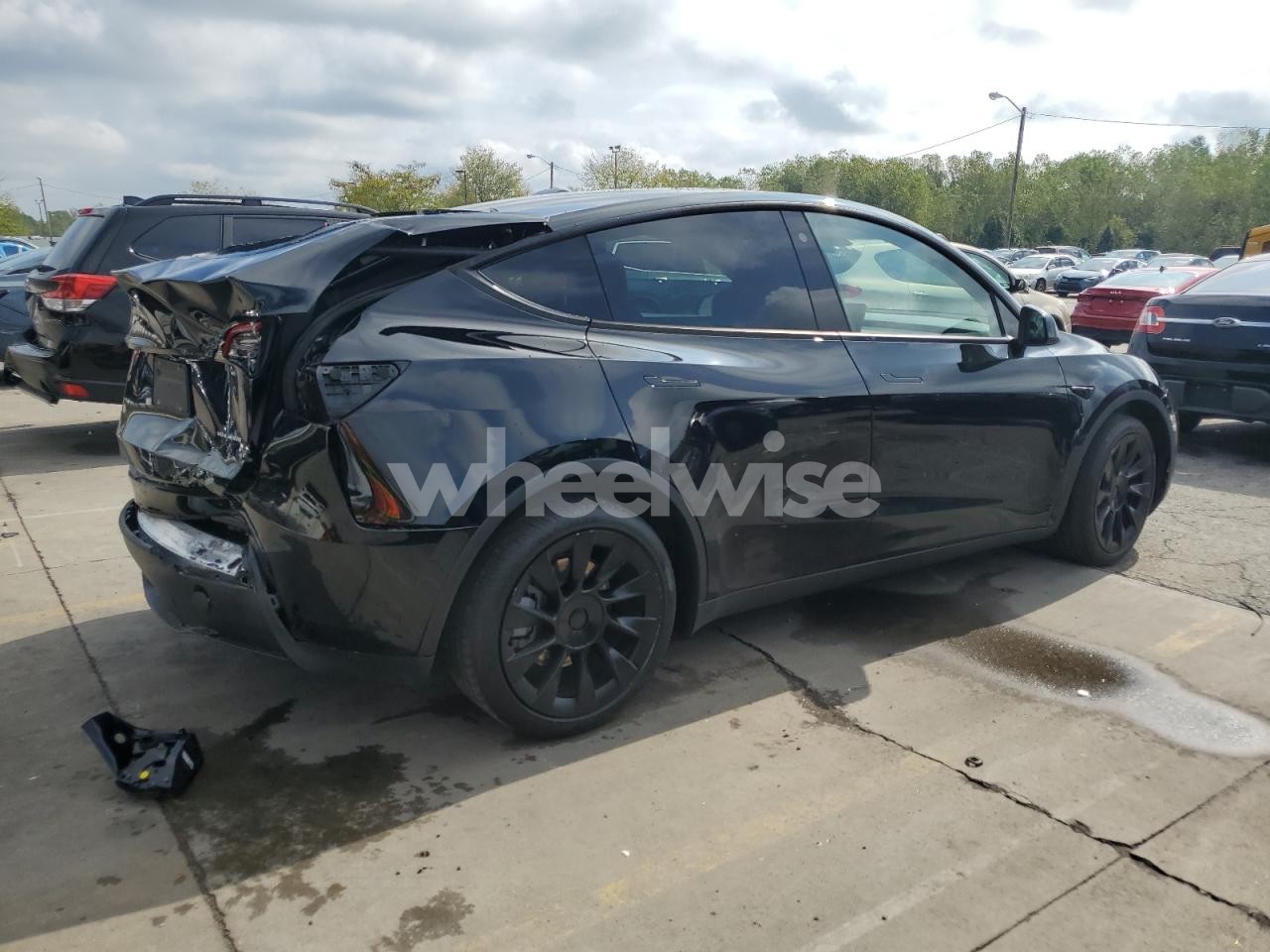 Photo 3 of 2023 TESLA MODEL Y (VIN 7SAYGDEE9PF777690)