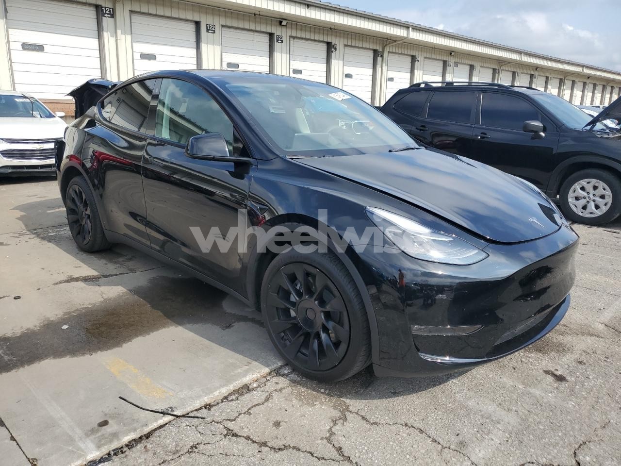 Photo 4 of 2023 TESLA MODEL Y (VIN 7SAYGDEE9PF777690)