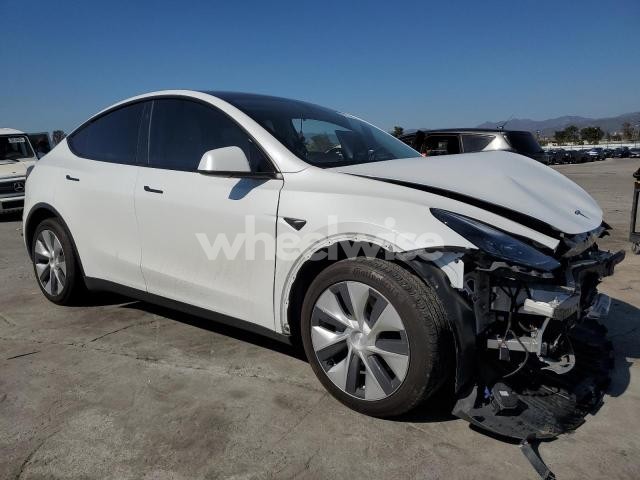 Photo 2 of 2023 TESLA MODEL Y (VIN 7SAYGDEE9PF878860)