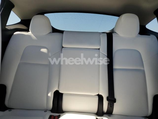 Photo 4 of 2023 TESLA MODEL Y (VIN 7SAYGDEE9PF878860)