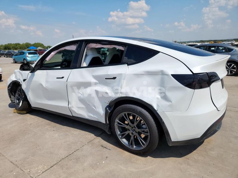 Photo 2 of 2024 TESLA MODEL Y (VIN 7SAYGDEE9RA321107)