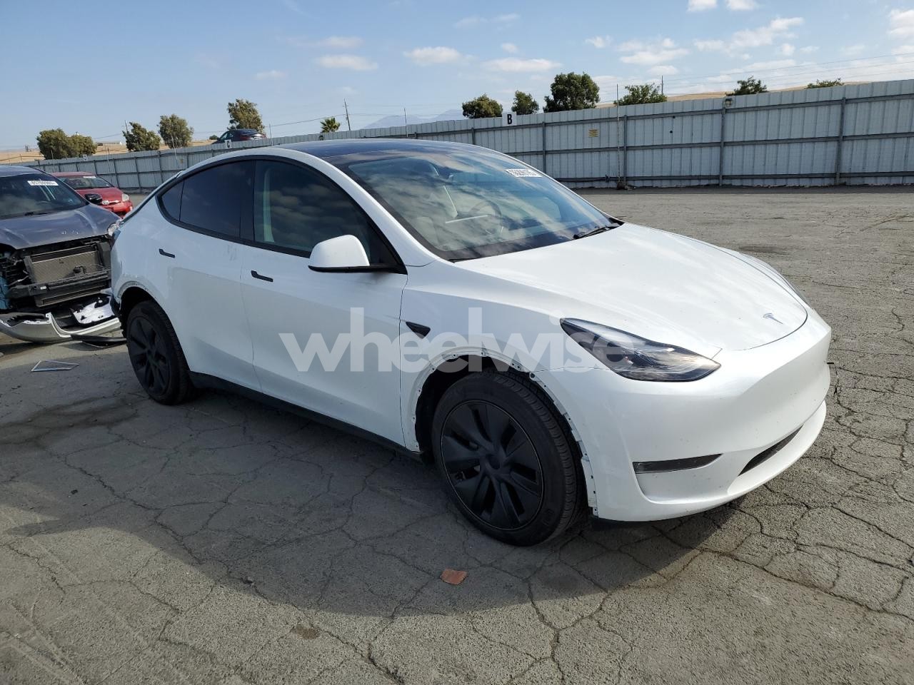 Photo 4 of 2024 TESLA MODEL Y (VIN 7SAYGDEE9RF129219)