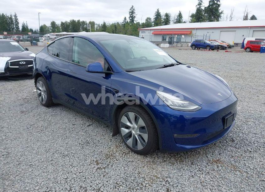 2022 Tesla Model Y LONG RANGE DUAL MOTOR ALL-WHEEL DRIVE (VIN 7SAYGDEEXNF409340) main photo