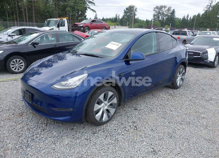 Photo 2 of 2022 Tesla Model Y LONG RANGE DUAL MOTOR ALL-WHEEL DRIVE (VIN 7SAYGDEEXNF409340)