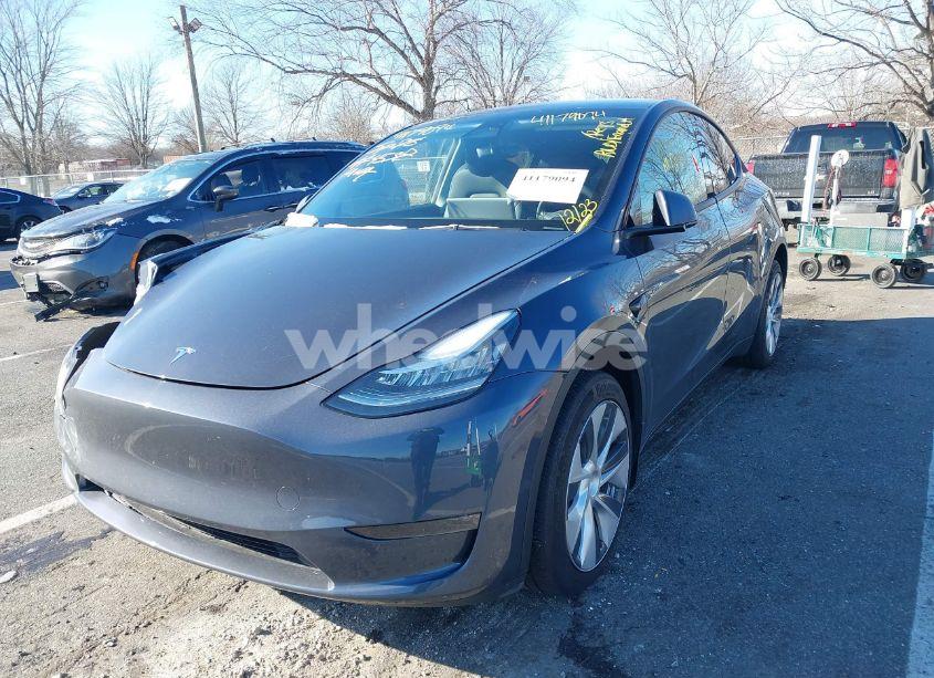 Photo 2 of 2023 Tesla Model Y AWD/LONG RANGE DUAL MOTOR ALL-WHEEL DRIVE (VIN 7SAYGDEEXPA090215)