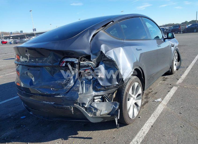 Photo 4 of 2023 Tesla Model Y AWD/LONG RANGE DUAL MOTOR ALL-WHEEL DRIVE (VIN 7SAYGDEEXPA090215)