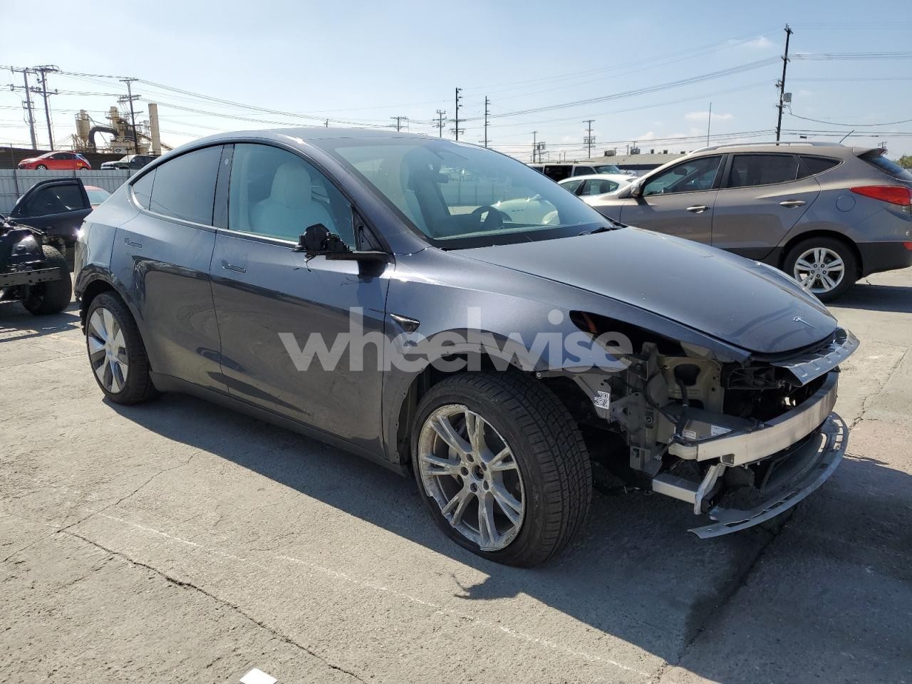 Photo 4 of 2023 TESLA MODEL Y (VIN 7SAYGDEEXPA119664)