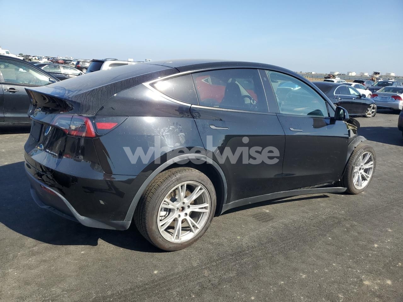 Photo 3 of 2023 TESLA MODEL Y (VIN 7SAYGDEEXPA122774)