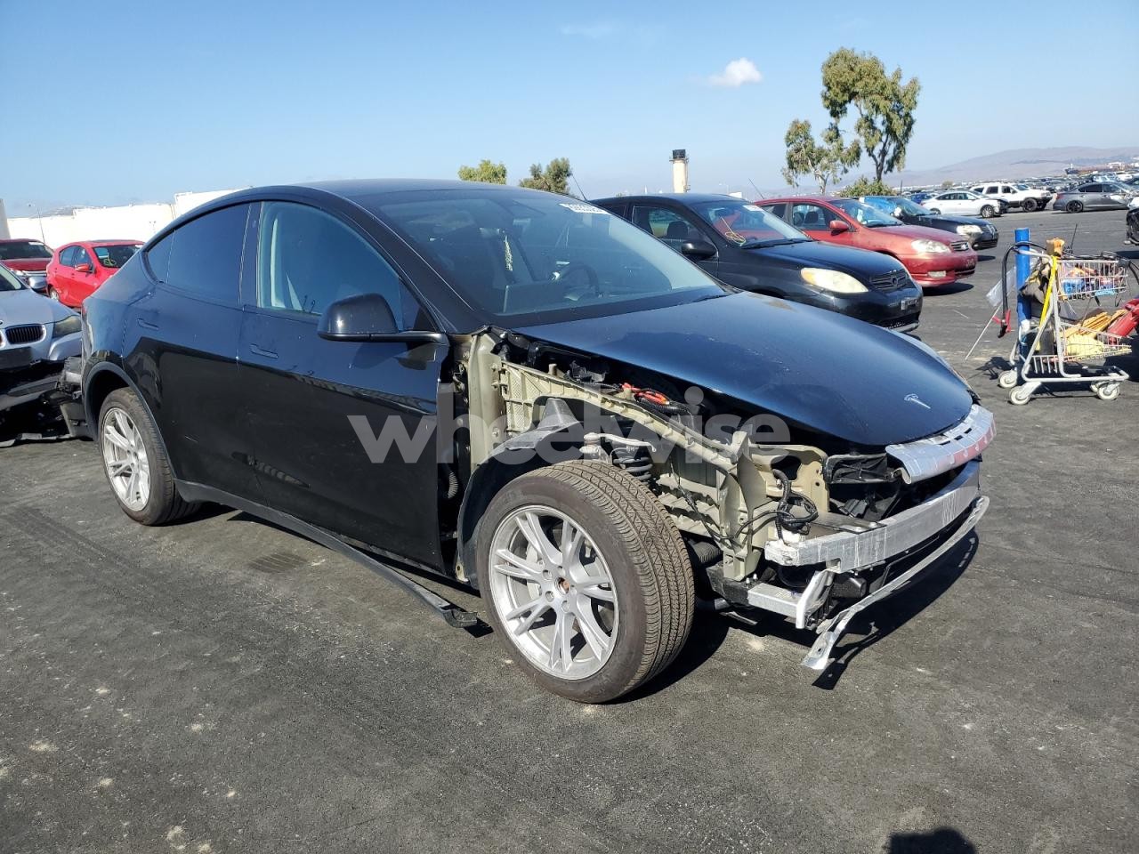 Photo 4 of 2023 TESLA MODEL Y (VIN 7SAYGDEEXPA122774)