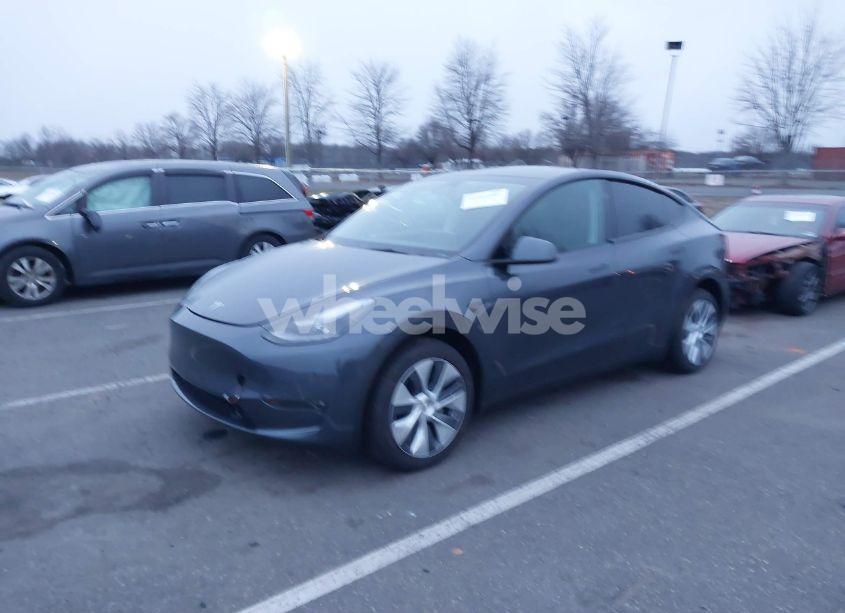 Photo 2 of 2023 Tesla Model Y AWD/LONG RANGE DUAL MOTOR ALL-WHEEL DRIVE (VIN 7SAYGDEEXPF865549)