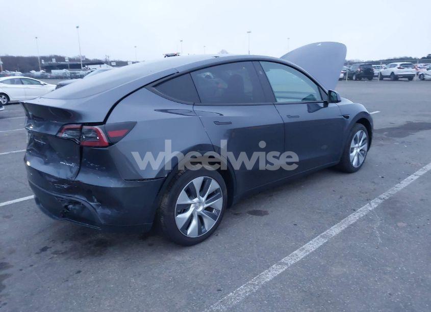 Photo 4 of 2023 Tesla Model Y AWD/LONG RANGE DUAL MOTOR ALL-WHEEL DRIVE (VIN 7SAYGDEEXPF865549)