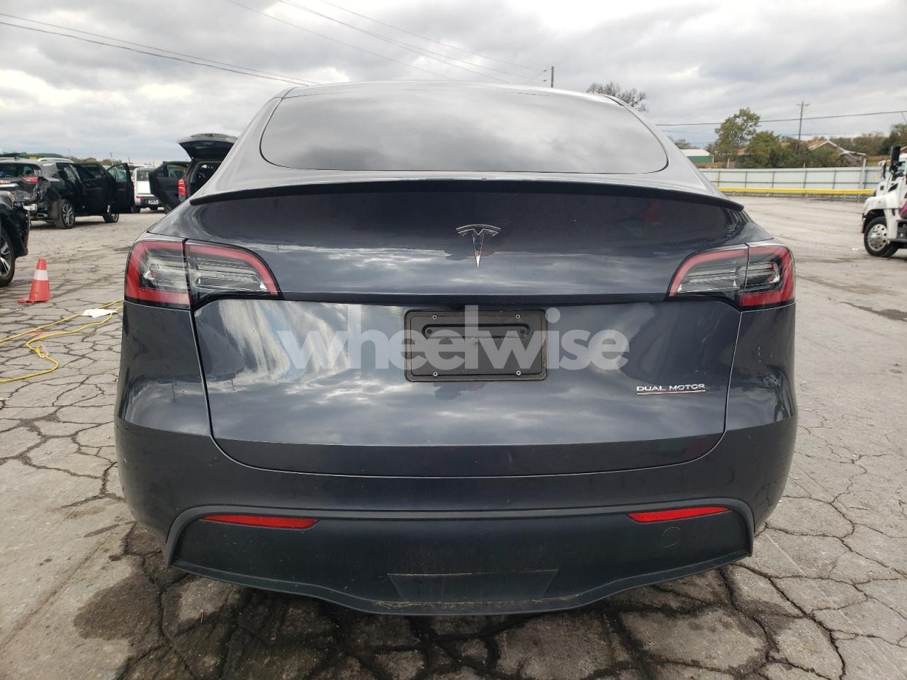 Photo 6 of 2023 TESLA MODEL Y (VIN 7SAYGDEF0PF921796)