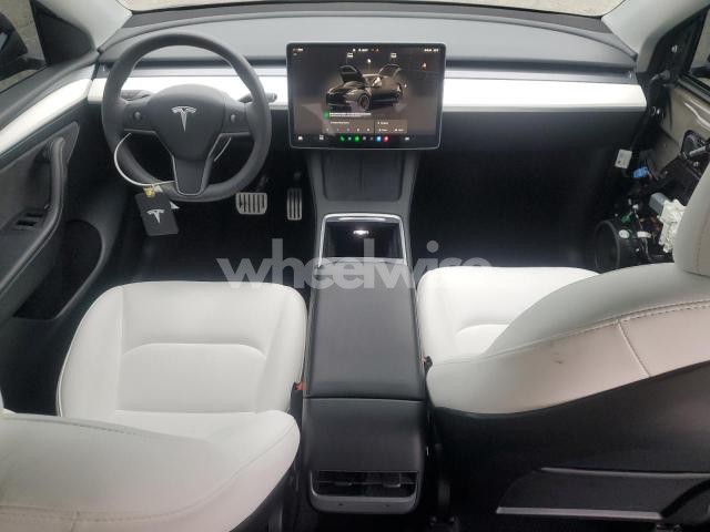 Photo 4 of 2023 TESLA MODEL Y (VIN 7SAYGDEF1PF593711)