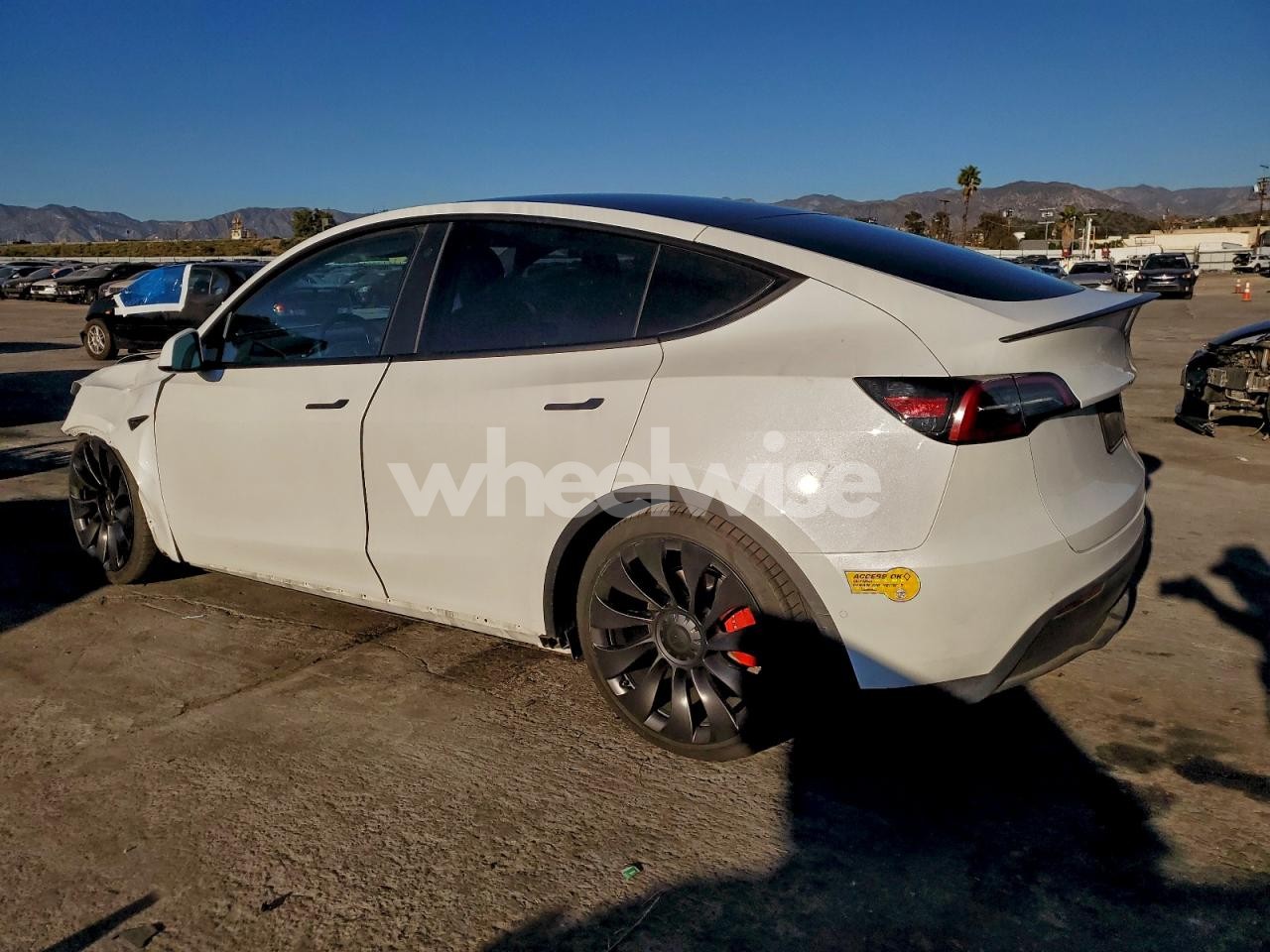 Photo 2 of 2022 TESLA MODEL Y (VIN 7SAYGDEF2NF390436)
