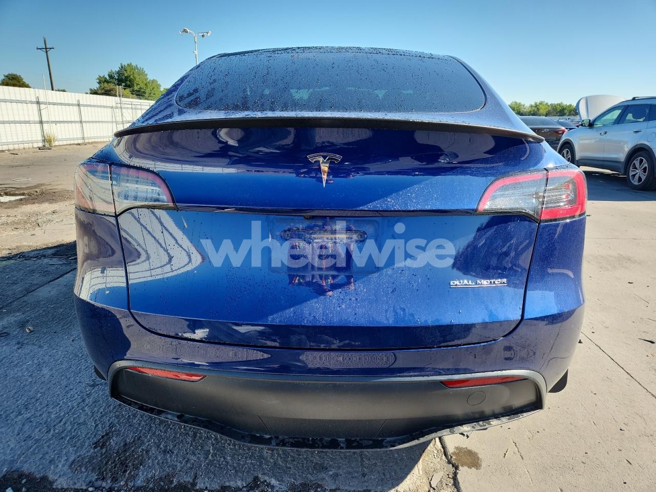 Photo 6 of 2023 TESLA MODEL Y (VIN 7SAYGDEF2PF784490)