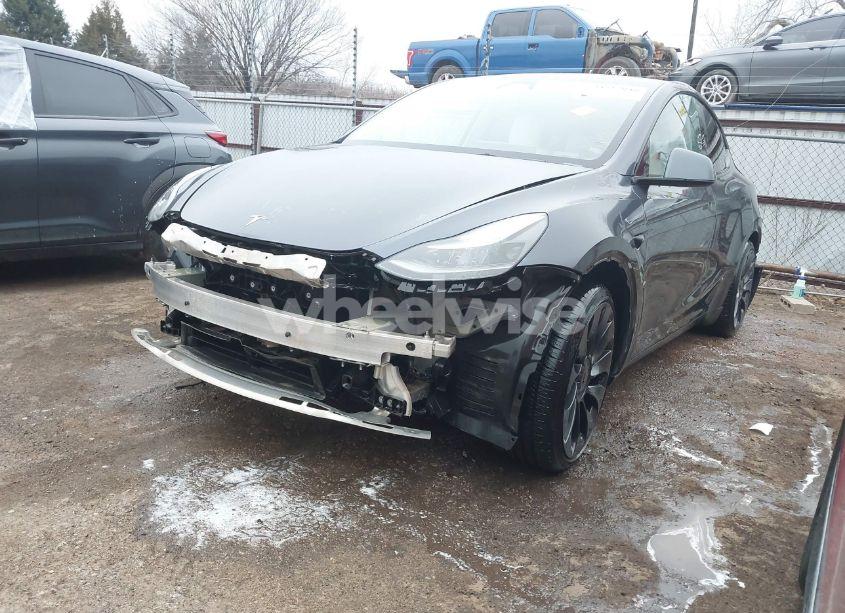 Photo 2 of 2023 Tesla Model Y (VIN 7SAYGDEF2PF978372)