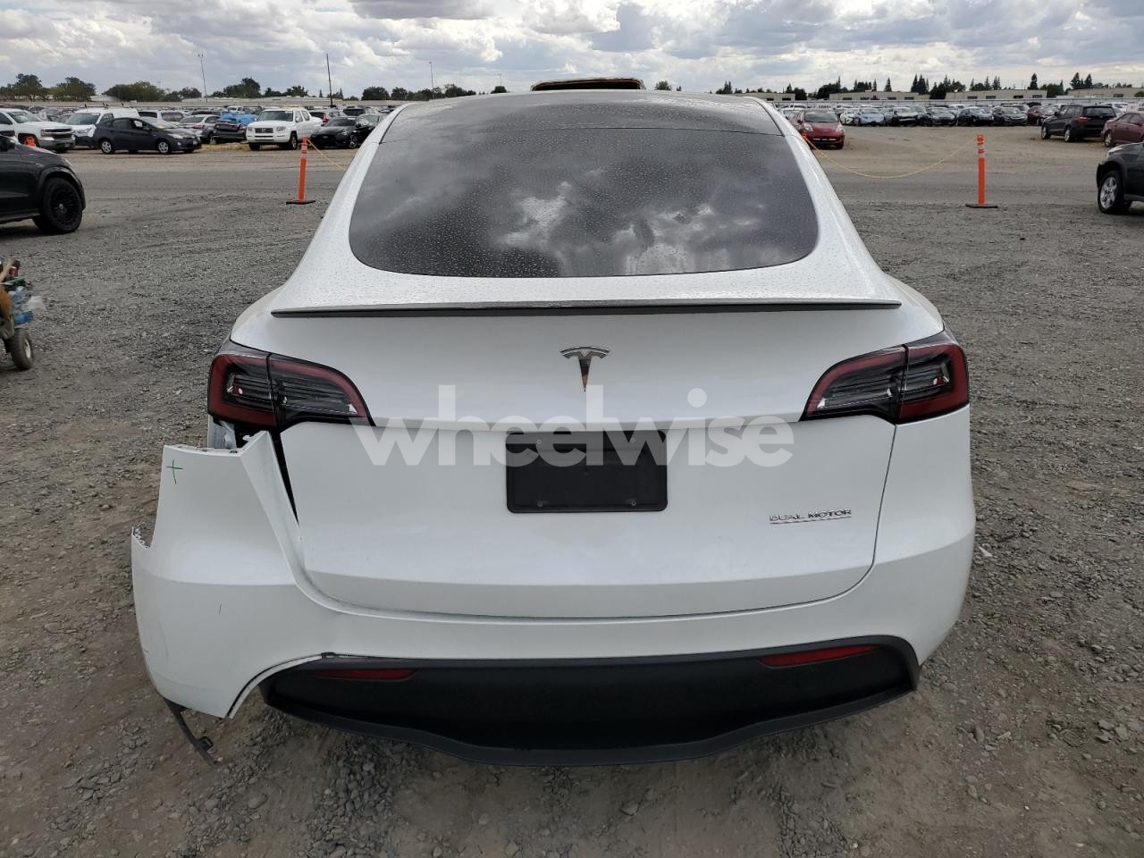 Photo 6 of 2023 TESLA MODEL Y (VIN 7SAYGDEF4PF662360)
