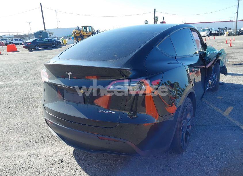 Photo 4 of 2022 Tesla Model Y PERFORMANCE DUAL MOTOR ALL-WHEEL DRIVE (VIN 7SAYGDEF5NF336693)