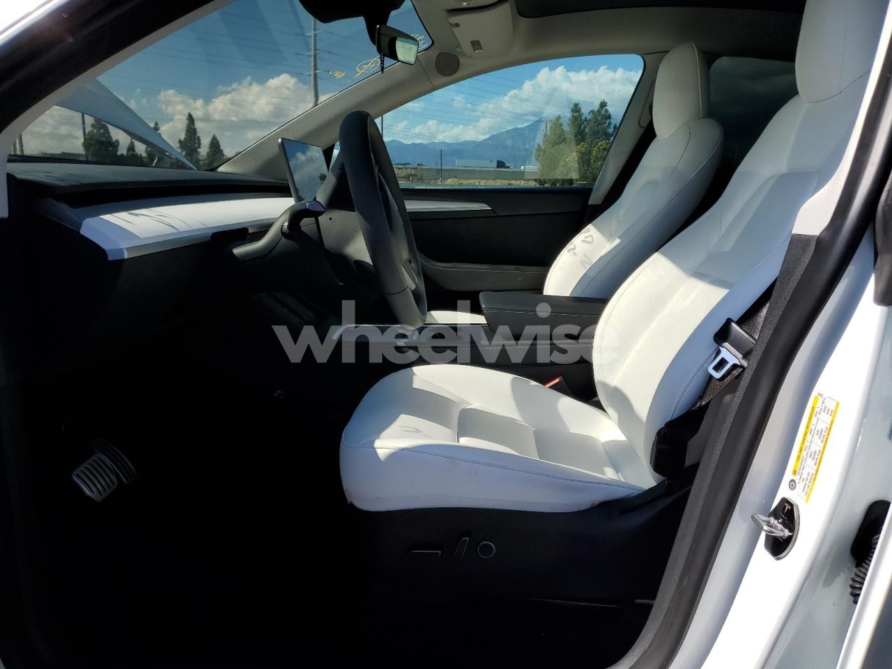 Photo 7 of 2023 TESLA MODEL Y (VIN 7SAYGDEF8PF645738)