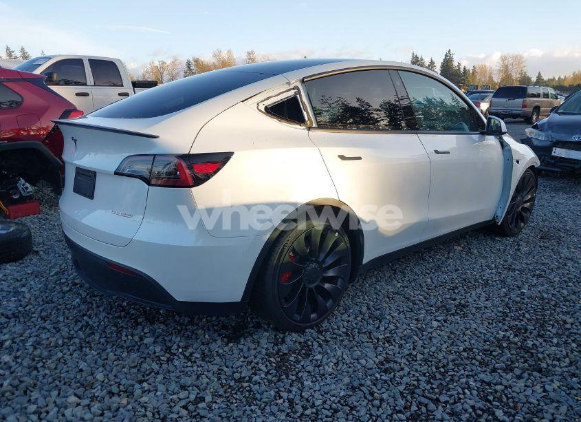 Photo 4 of 2023 Tesla Model Y AWD/PERFORMANCE DUAL MOTOR ALL-WHEEL DRIVE (VIN 7SAYGDEF8PF663950)