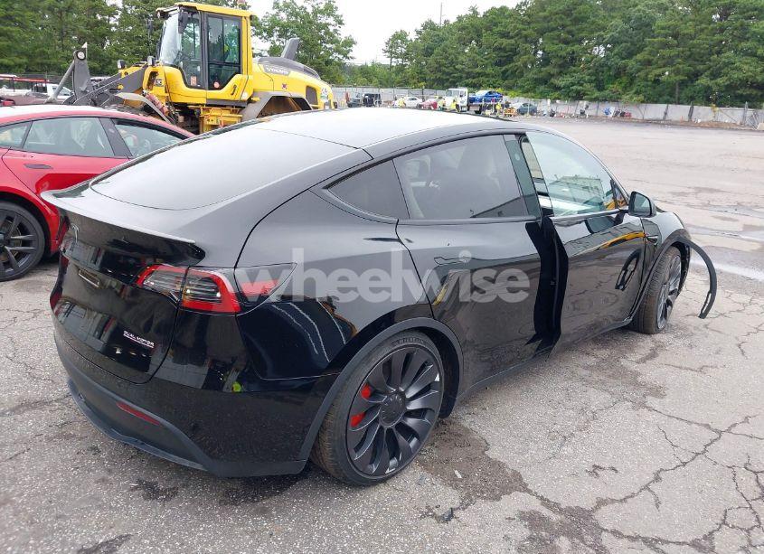 Photo 4 of 2023 Tesla Model Y (VIN 7SAYGDEF8PF967702)