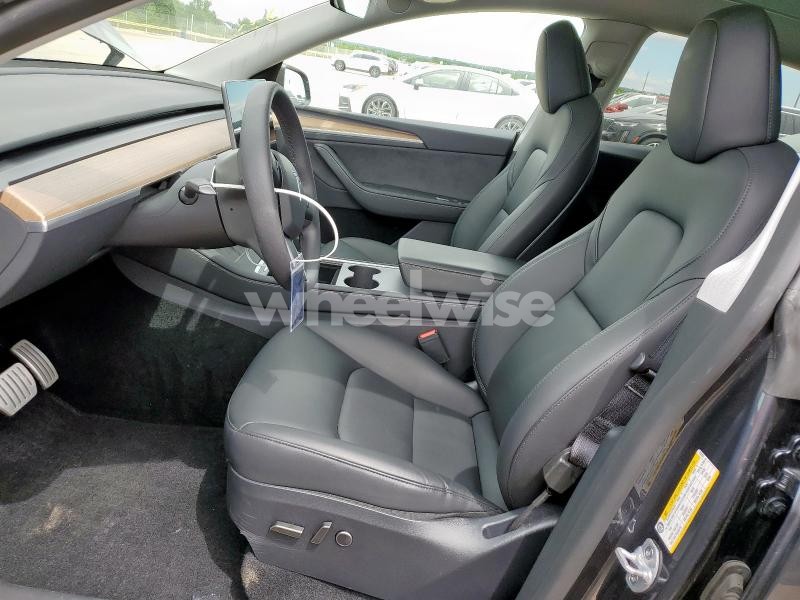 Photo 2 of 2024 TESLA MODEL Y (VIN 7SAYGDEF9RA312951)