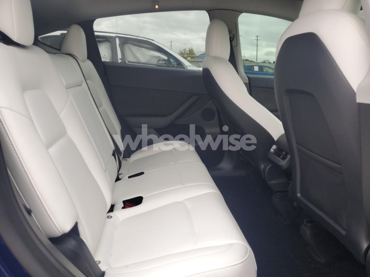 Photo 10 of 2022 TESLA MODEL Y (VIN 7SAYGDEFXNF530846)