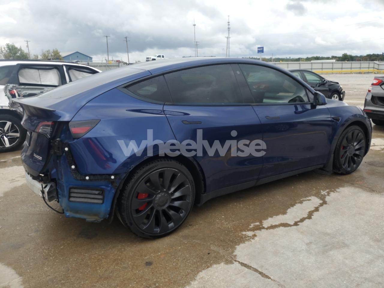Photo 3 of 2022 TESLA MODEL Y (VIN 7SAYGDEFXNF530846)