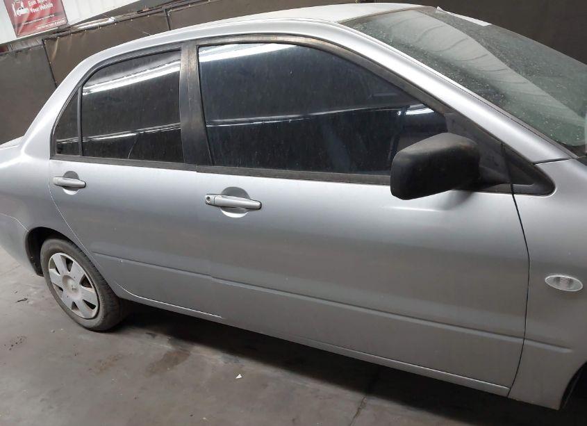 Photo 13 of 2005 Mitsubishi Lancer ES (VIN JA3AJ26E05U040531)