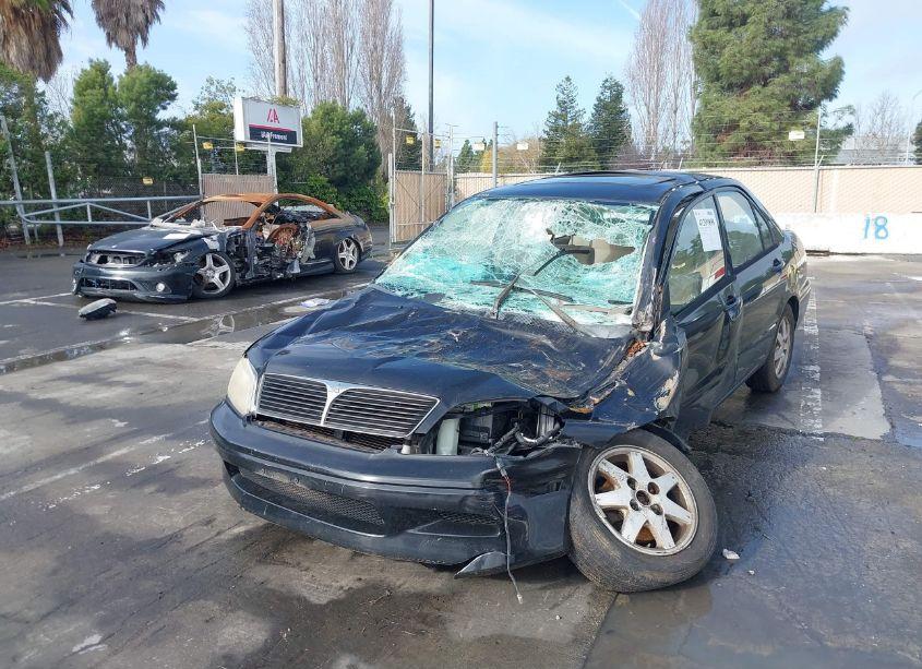 Photo 2 of 2003 Mitsubishi Lancer LS (VIN JA3AJ36E23U113398)