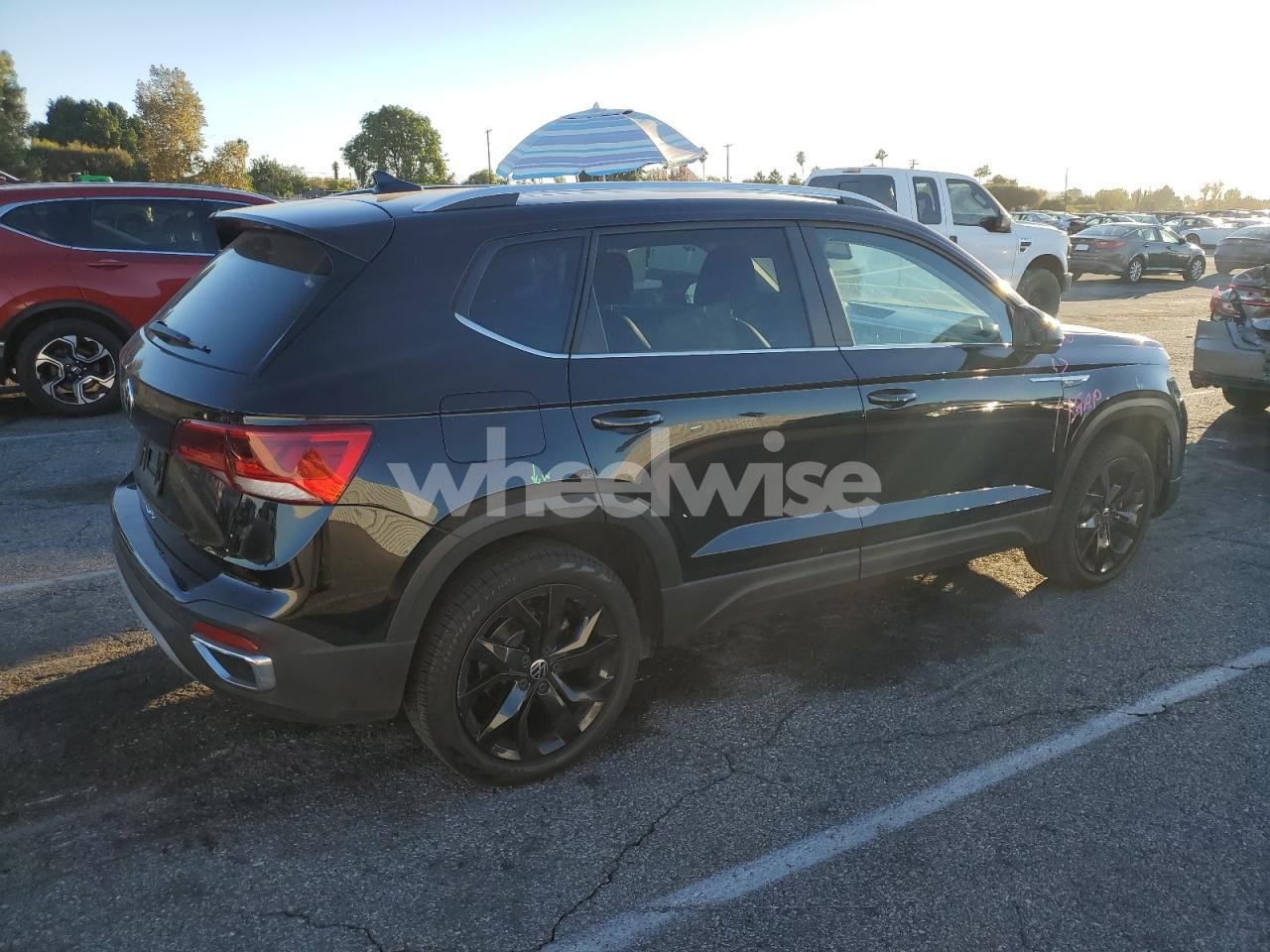 Photo 3 of 2022 VOLKSWAGEN TAOS SE (VIN JF1GD66575H519554)