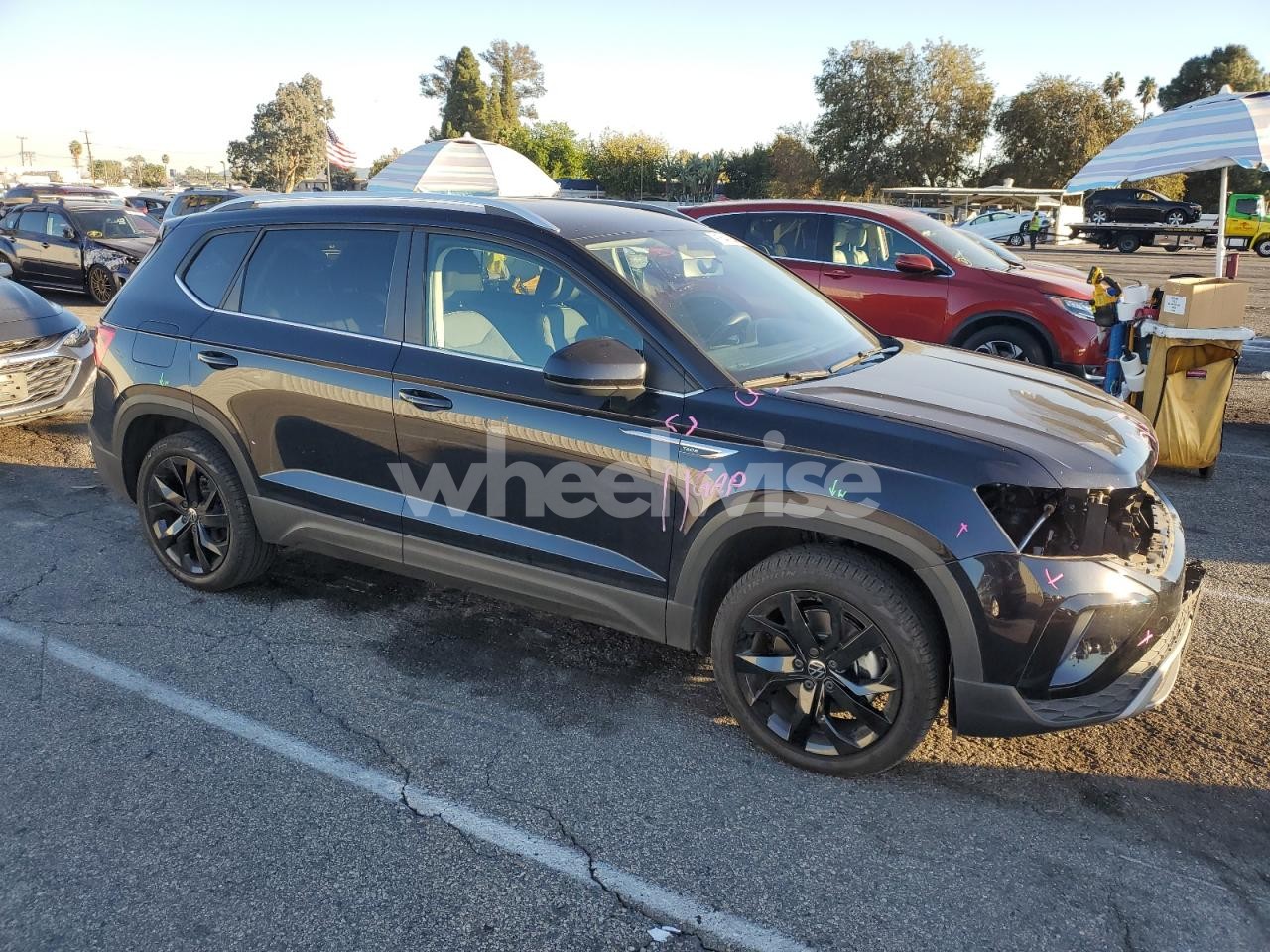 Photo 4 of 2022 VOLKSWAGEN TAOS SE (VIN JF1GD66575H519554)