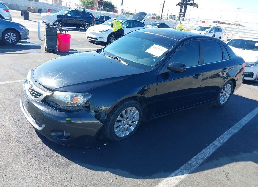 Photo 2 of 2009 Subaru Impreza 2.5I (VIN JF1GE606X9H506057)
