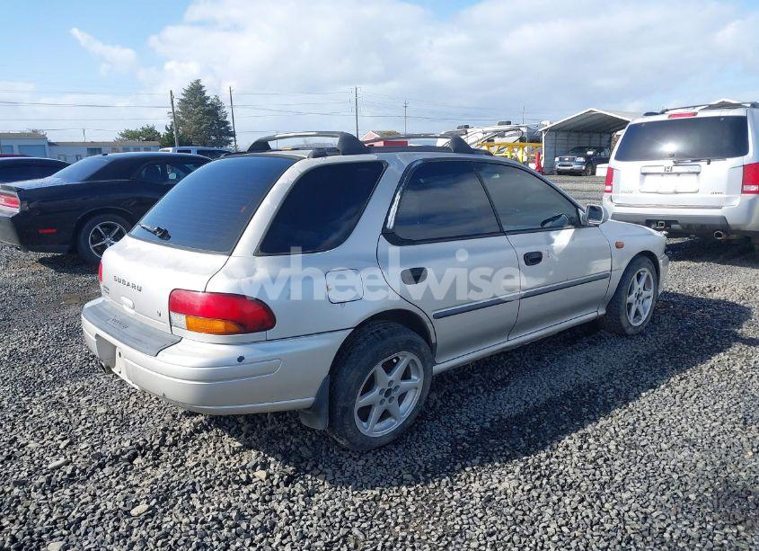 Photo 4 of 1999 Subaru Impreza L (VIN JF1GF4358XH800333)