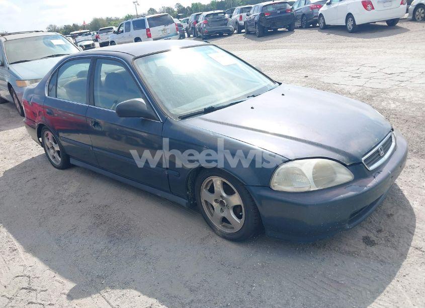 1997 Honda Civic LX (VIN JHMEJ6574VS013842) main photo