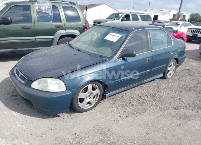 Photo 2 of 1997 Honda Civic LX (VIN JHMEJ6574VS013842)