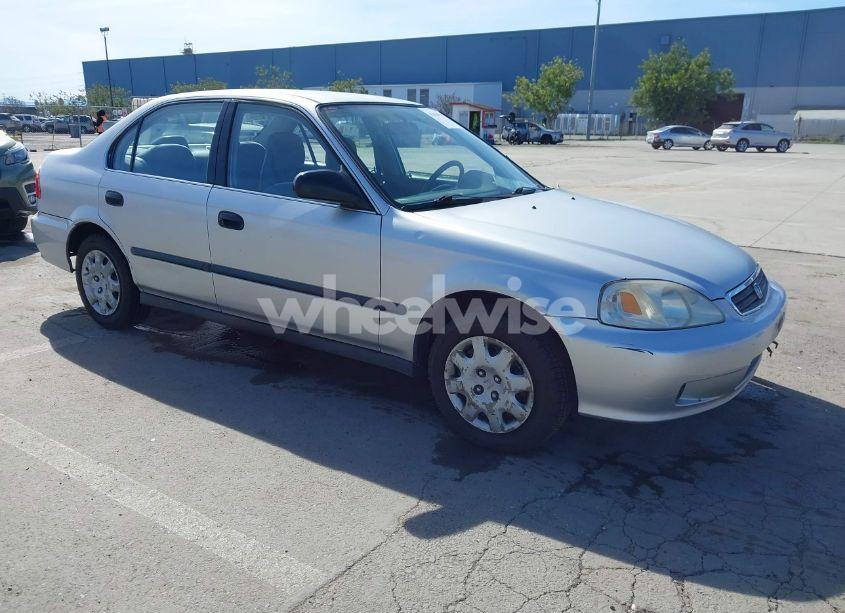 1999 Honda Civic LX (VIN JHMEJ6670XS000958) main photo