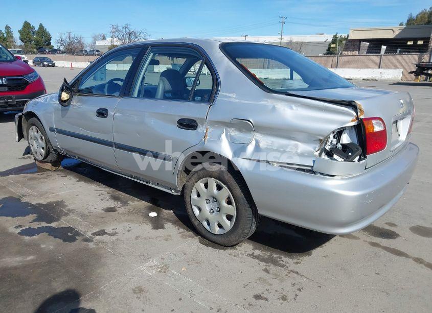 Photo 3 of 1999 Honda Civic LX (VIN JHMEJ6670XS000958)