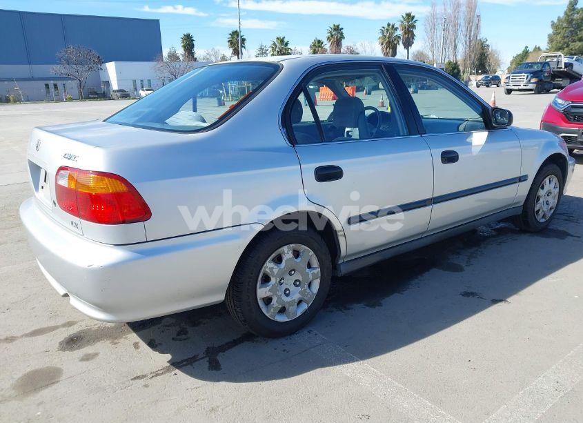 Photo 4 of 1999 Honda Civic LX (VIN JHMEJ6670XS000958)