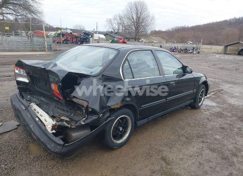 Photo 4 of 2000 Honda Civic LX (VIN JHMEJ6672YS009999)