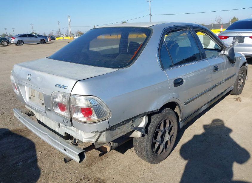 Photo 4 of 1999 Honda Civic LX (VIN JHMEJ667XXS003124)