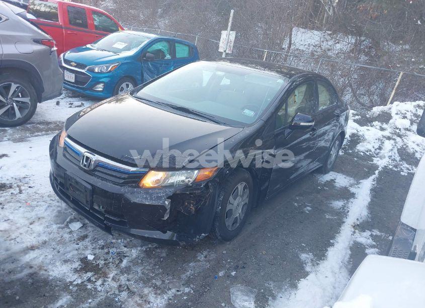 Photo 2 of 2012 Honda Civic HYBRID BASE (CVT) (VIN JHMFB4F27CS011329)