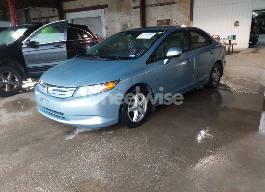 Photo 2 of 2012 Honda Civic HYBRID (VIN JHMFB4F2XCS000227)