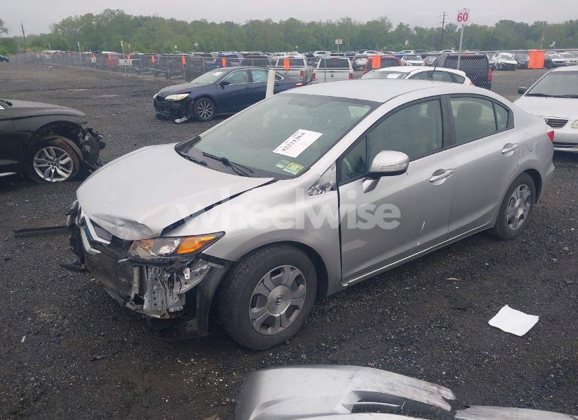 Photo 2 of 2012 Honda Civic HYBRID (VIN JHMFB4F3XCS007123)